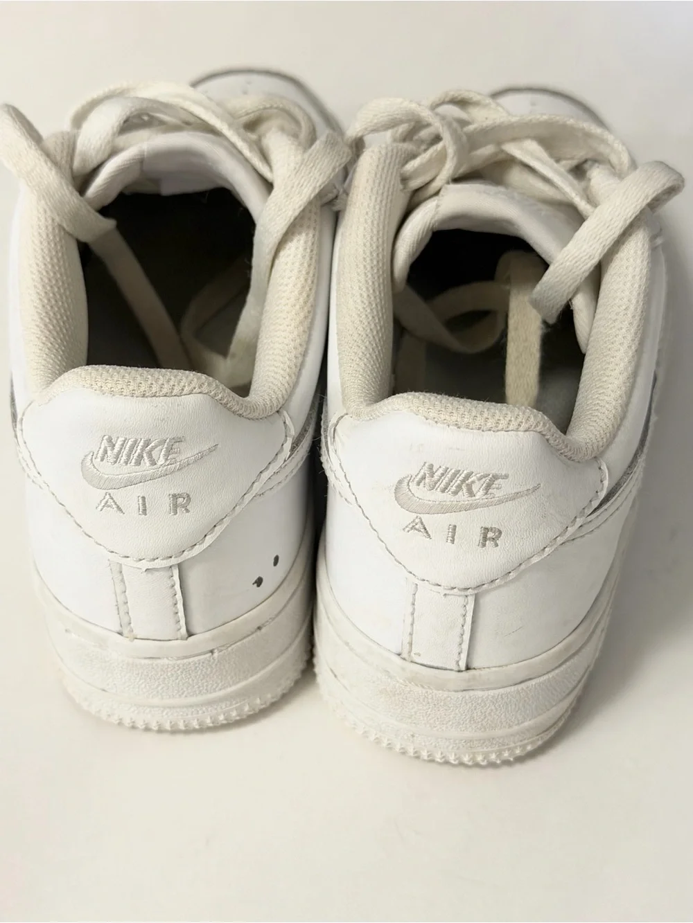 Nike Kids White Low-Top Sneakers with Silver Accents